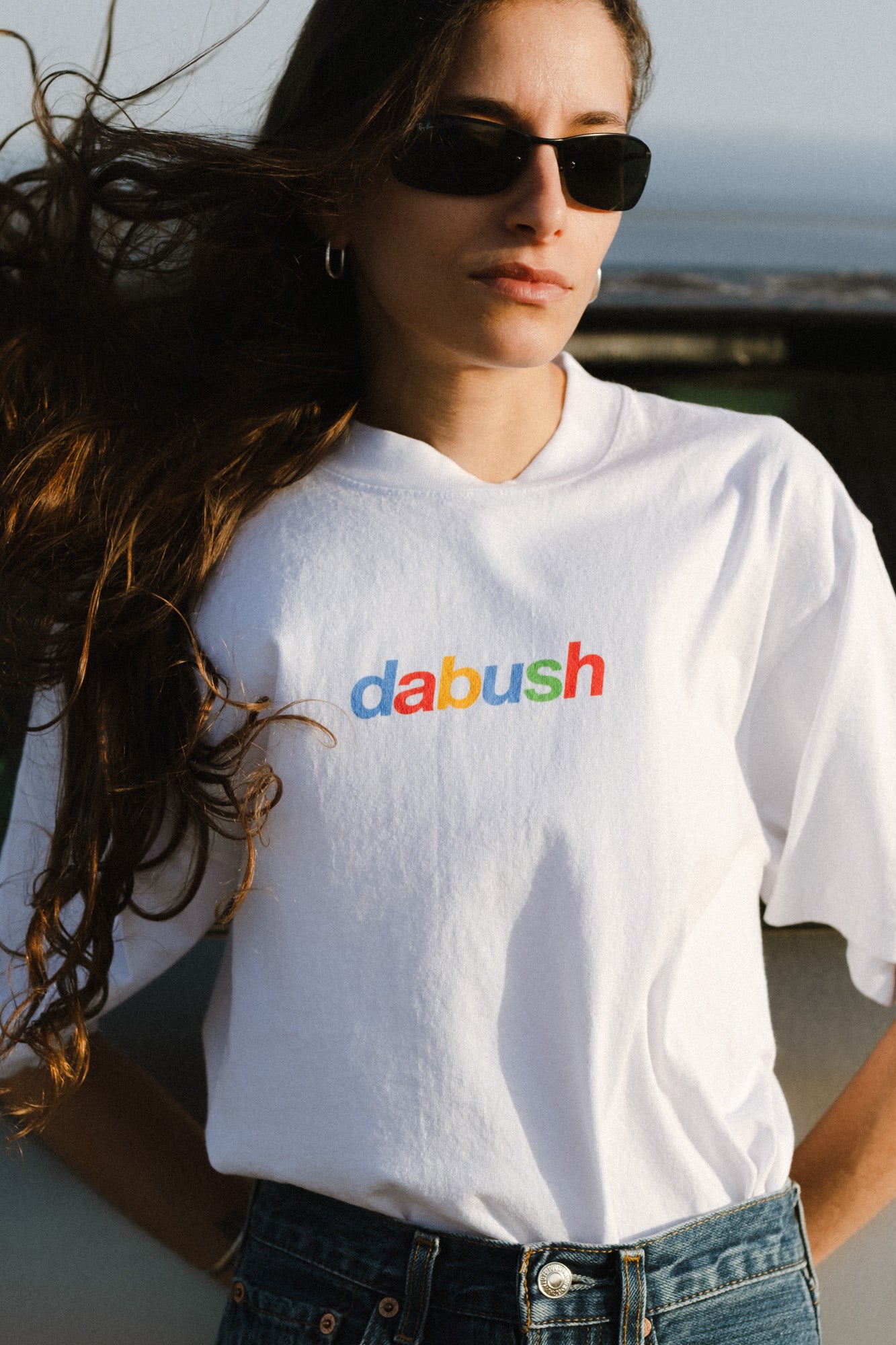 DABUSH T-SHIRT. 100% Cotton, oversized tee with Back and front print. Made in Tel aviv. Shop and view the latest Drops from the official DABUSH website. Worldwide Shipping. DABUSH is a publishing house, design studio and a brand based in Tel Aviv, Israel.