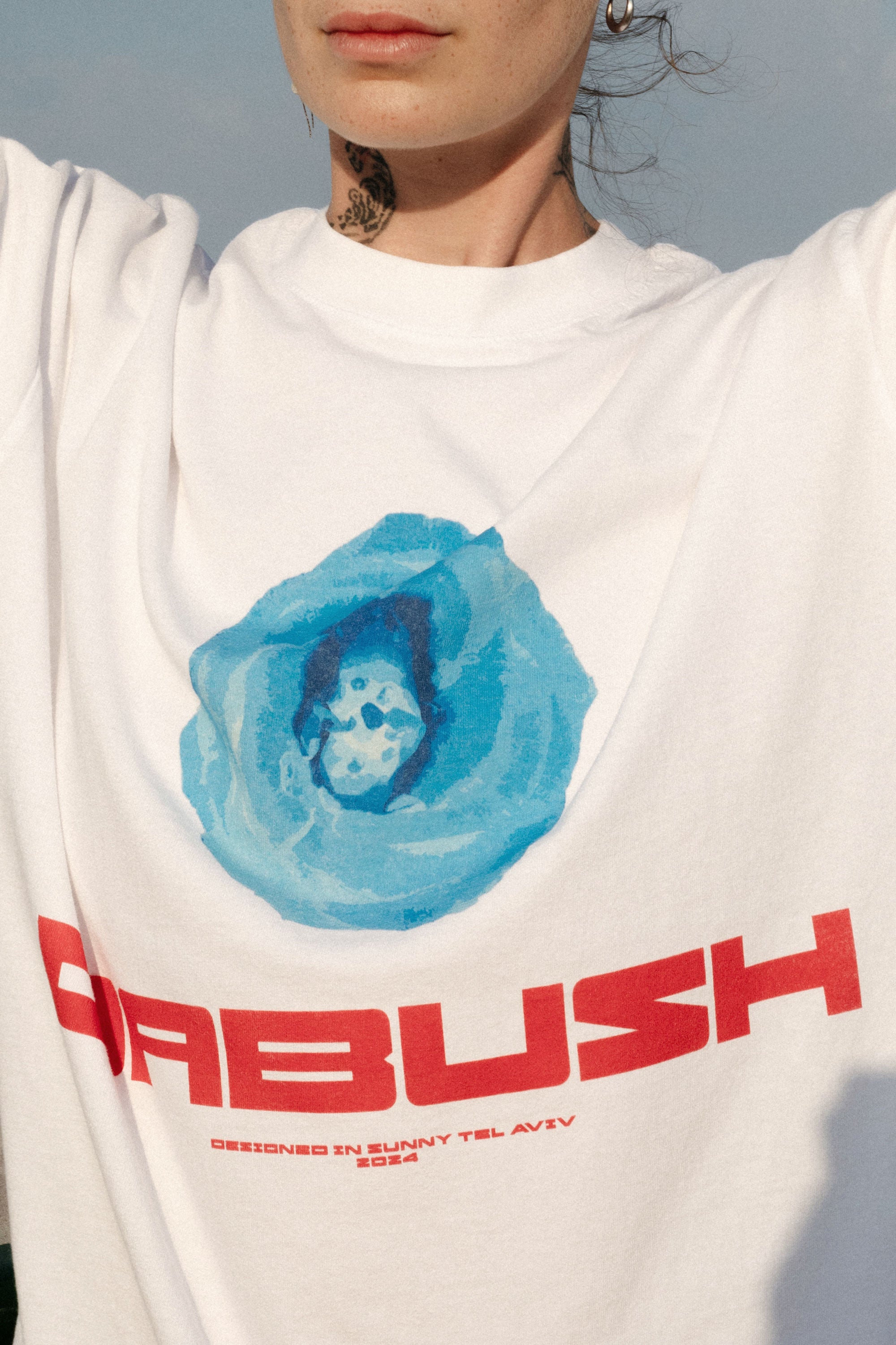 DABUSH T-SHIRTS. 100% Cotton, oversized tee with Back and front print. Made in Tel aviv. Shop and view the latest Drops from the official DABUSH website. Worldwide Shipping. DABUSH is a publishing house, design studio and a brand based in Tel Aviv, Israel.
