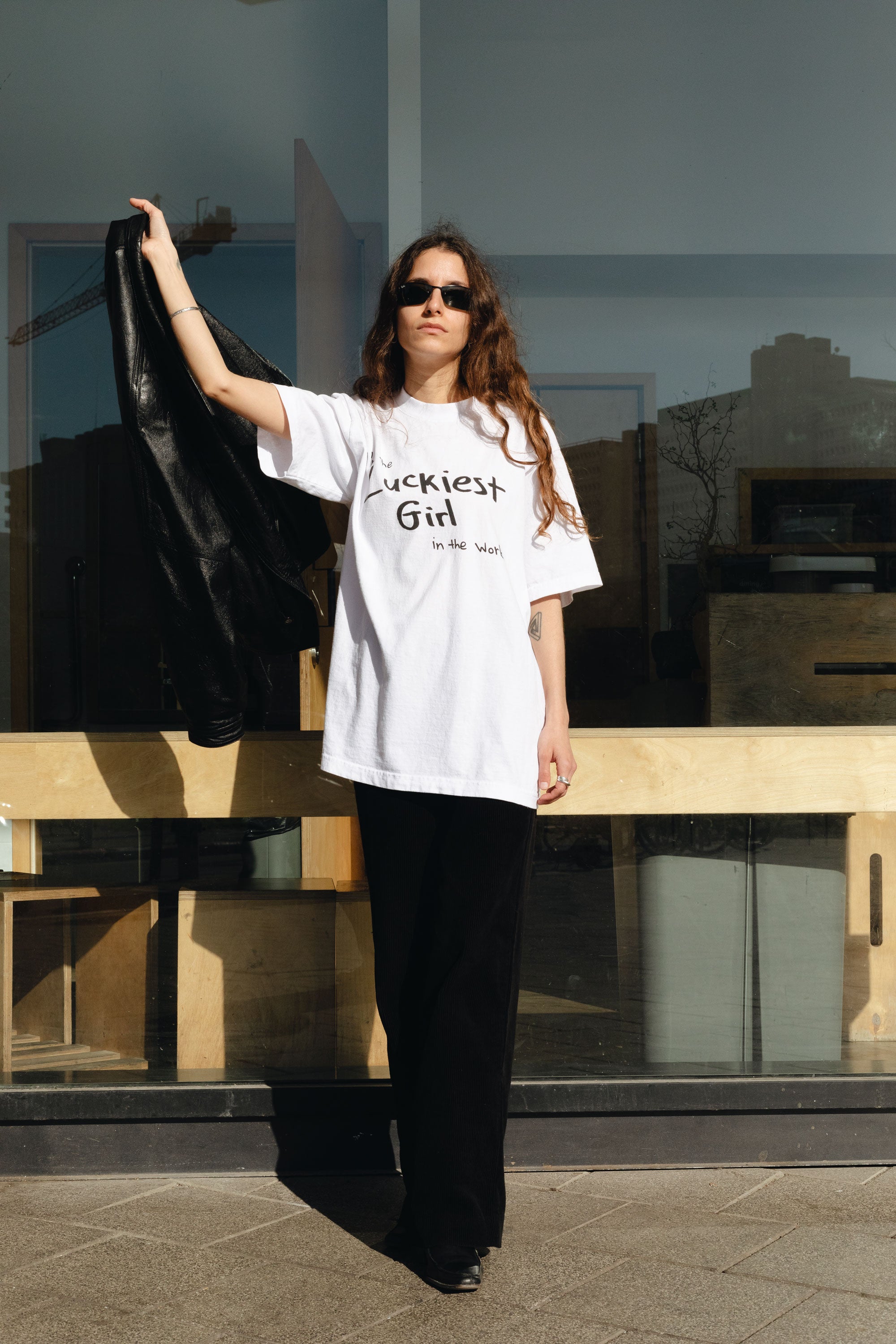 DABUSH LUCKY GIRL T-SHIRT. 100% Cotton, oversized tee with Back and front print. Made in Tel aviv. Shop and view the latest Drops from the official DABUSH website. Worldwide Shipping. DABUSH is a publishing house, design studio and a brand based in Tel Aviv, Israel. Lucky Girl Syndrome T-SHIRT.