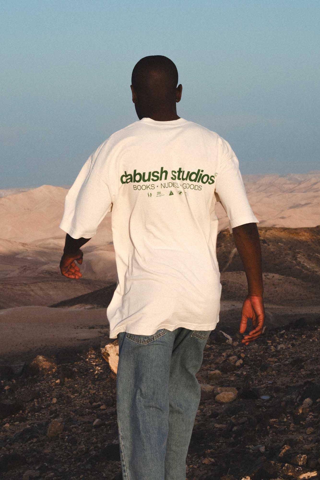 DABUSH T-SHIRT. 100% Cotton, oversized tee with Back and front print. Made in Tel aviv. Shop and view the latest Drops from the official DABUSH website. Worldwide Shipping. DABUSH is a publishing house, design studio and a brand based in Tel Aviv, Israel.