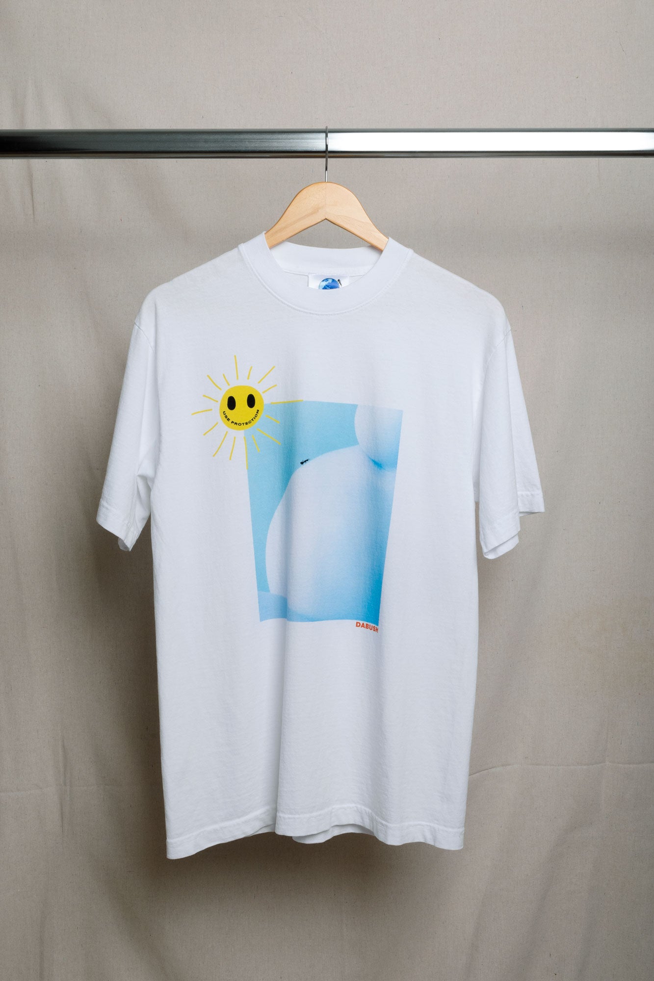 DABUSH PROTECTION T-SHIRT. 100% Cotton, oversized tee with Back and front print. Made in Tel aviv. Shop and view the latest Drops from the official DABUSH website. Worldwide Shipping. DABUSH is a publishing house, design studio and a brand based in Tel Aviv, Israel.