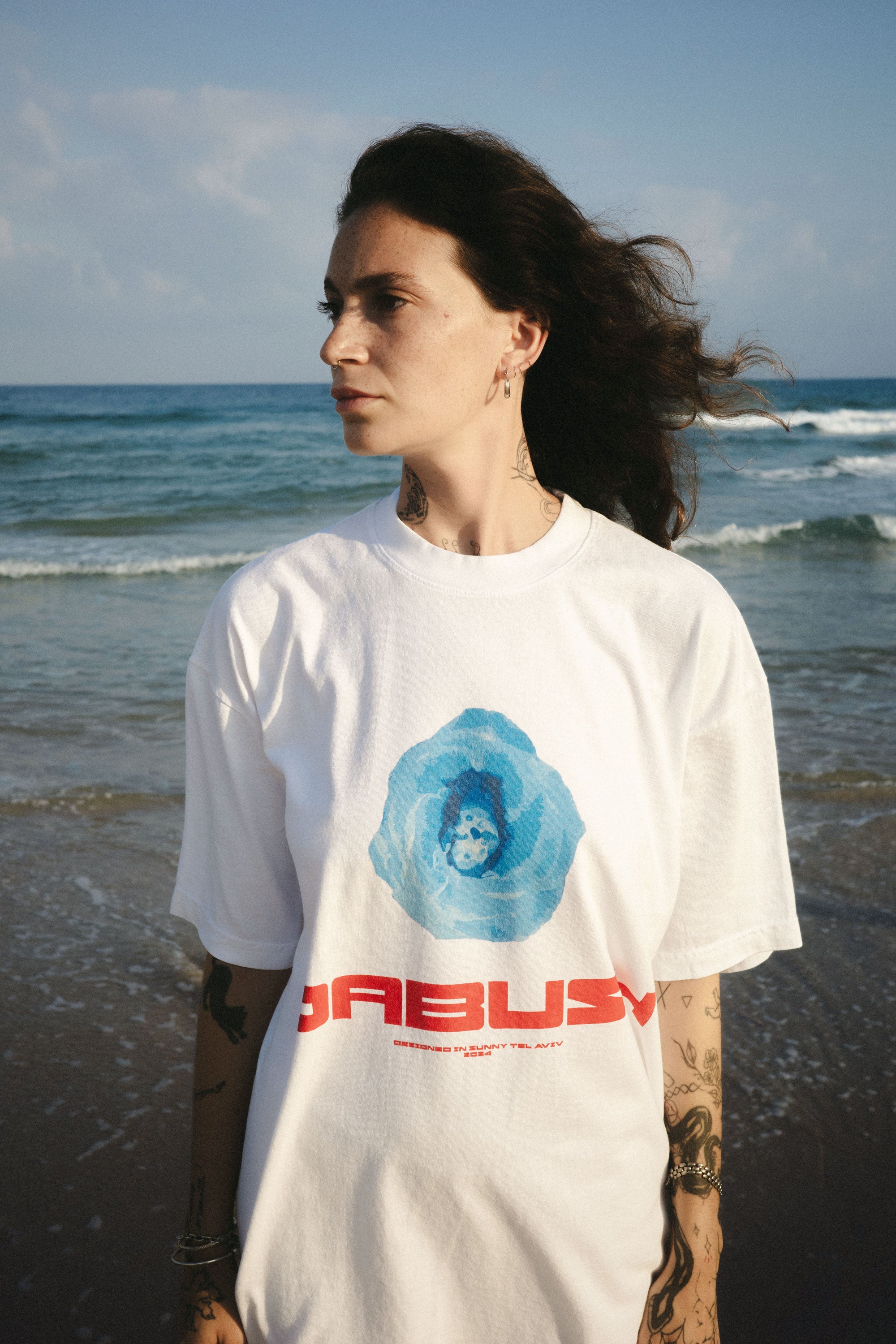 DABUSH T-SHIRTS. 100% Cotton, oversized tee with Back and front print. Made in Tel aviv. Shop and view the latest Drops from the official DABUSH website. Worldwide Shipping. DABUSH is a publishing house, design studio and a brand based in Tel Aviv, Israel.