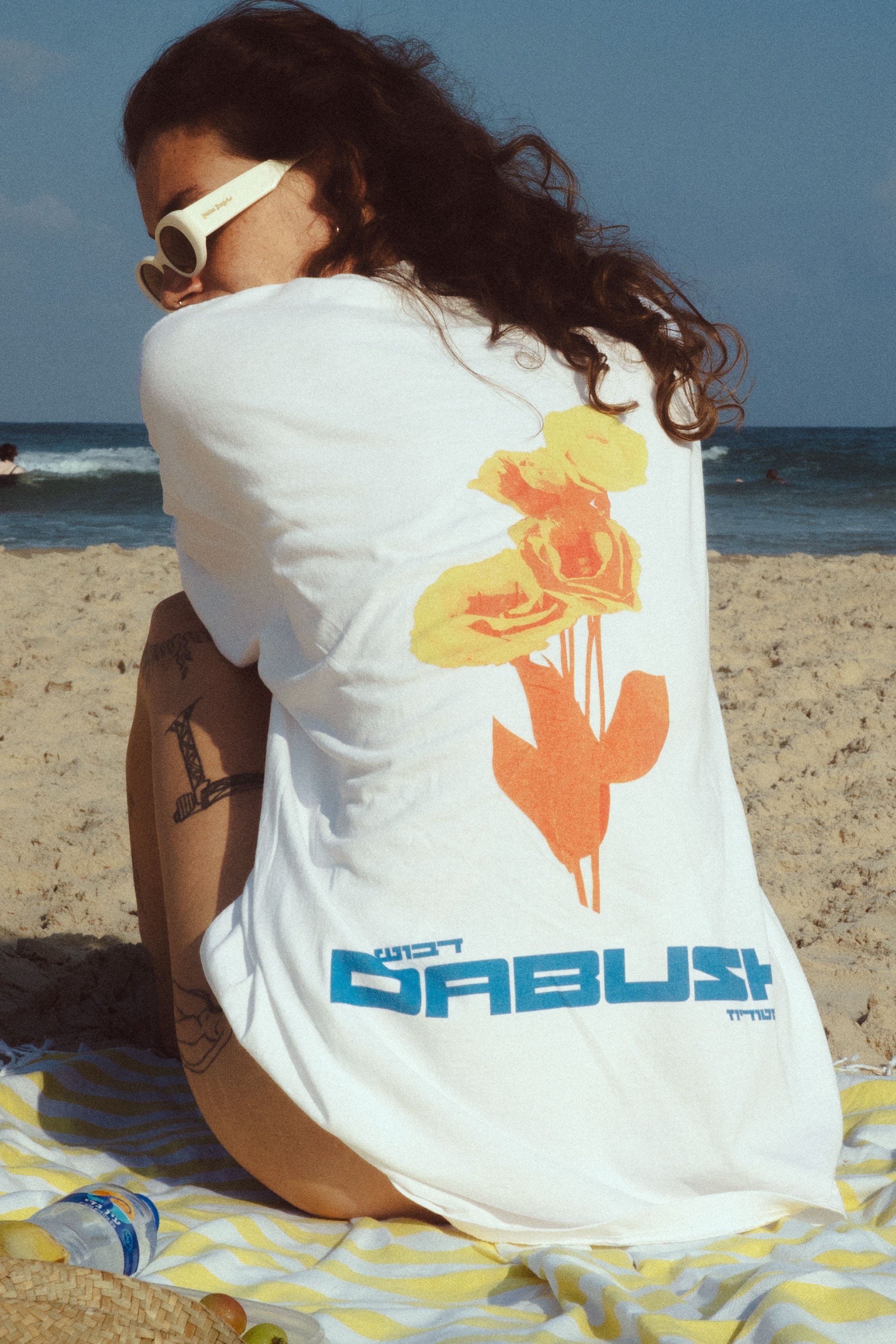 DABUSH T-SHIRTS. 100% Cotton, oversized tee with Back and front print. Made in Tel aviv. Shop and view the latest Drops from the official DABUSH website. Worldwide Shipping. DABUSH is a publishing house, design studio and a brand based in Tel Aviv, Israel.