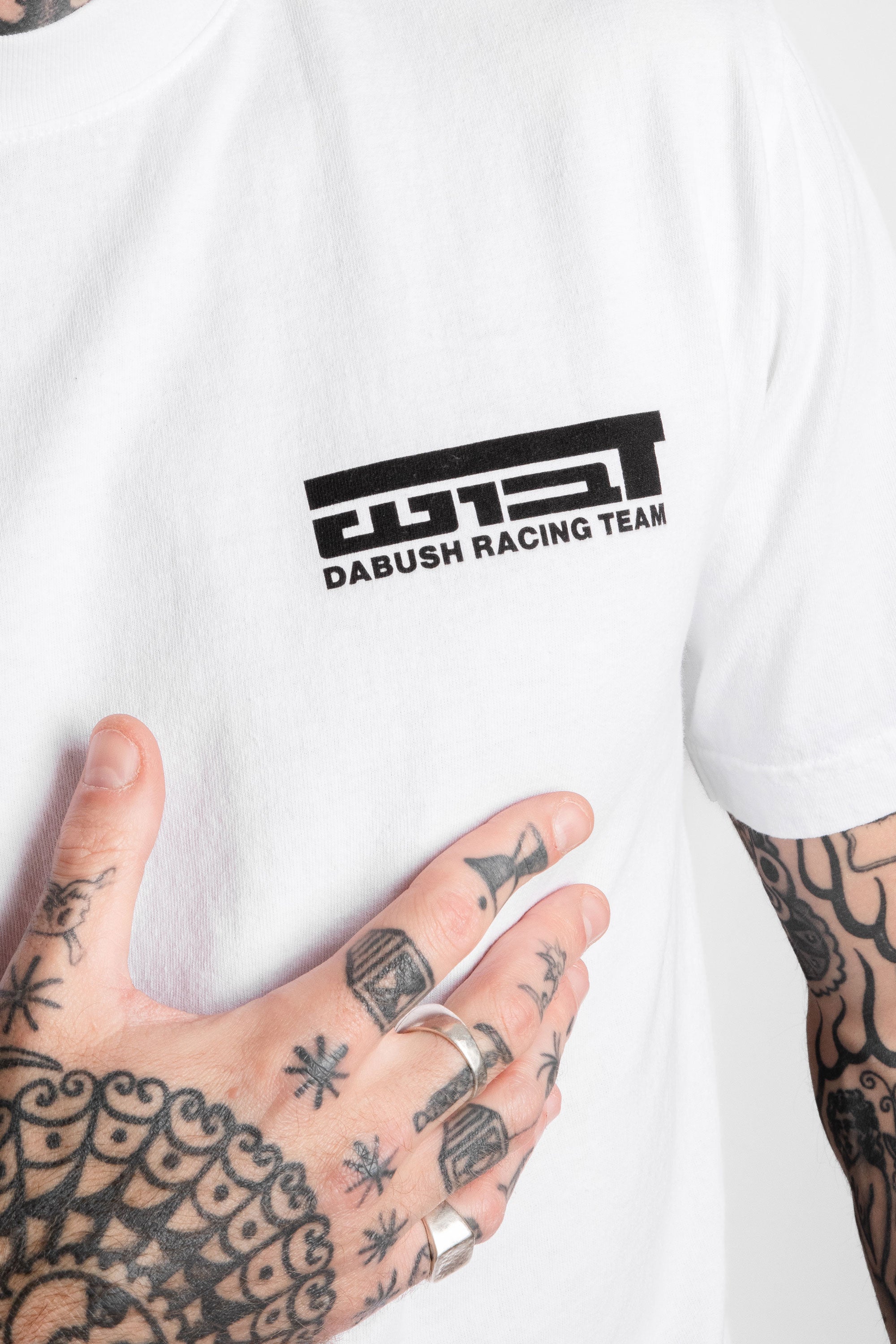 DABUSH MOTORACING T-SHIRT. 100% Cotton, oversized tee with Back and front print. Made in Tel aviv. Shop and view the latest Drops from the official DABUSH website. Worldwide Shipping. DABUSH is a publishing house, design studio and a brand based in Tel Aviv, Israel.