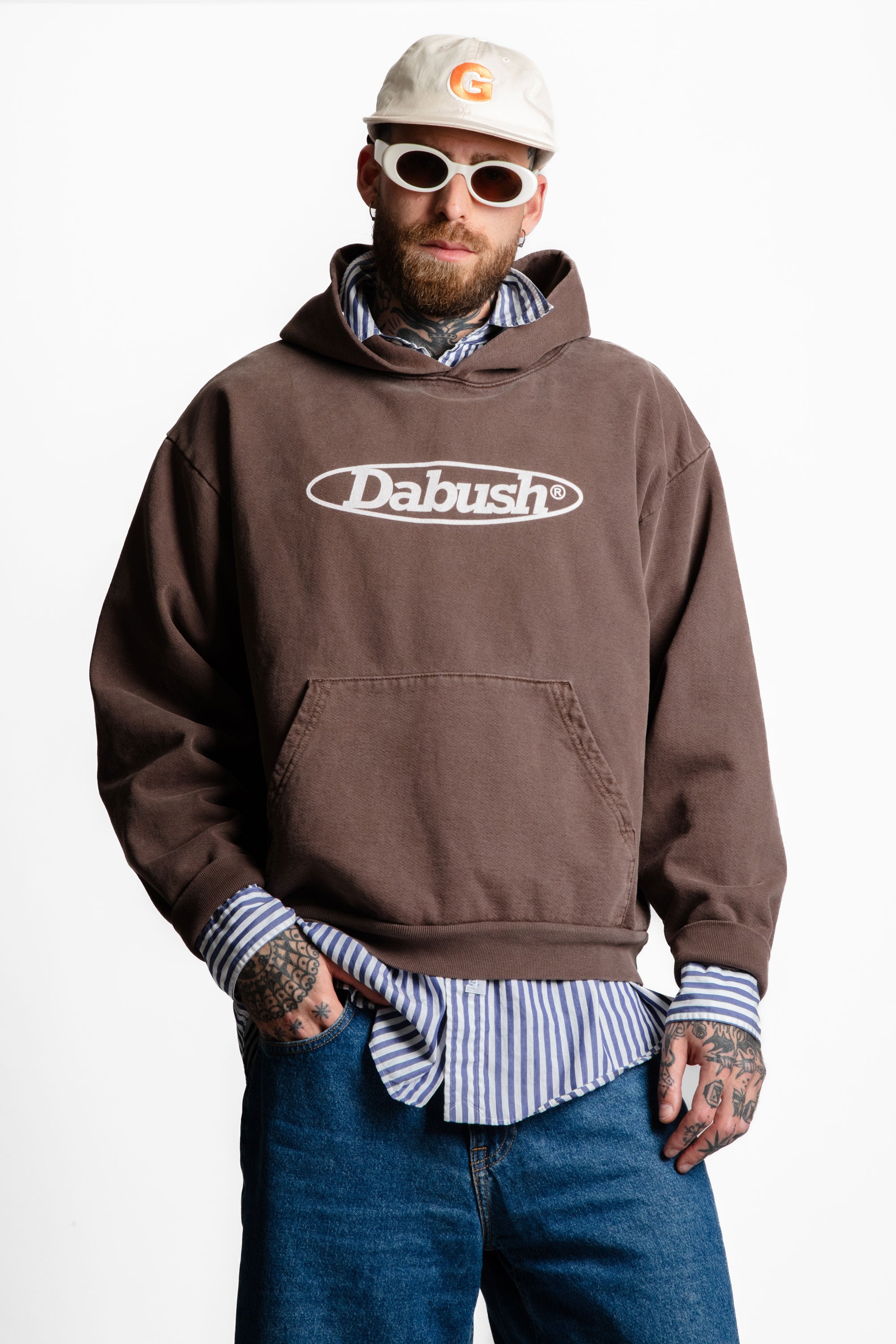 DABUSH MOTORACING HOODIE. 100% Cotton, oversized tee with Back and front print. Made in Tel aviv. Shop and view the latest Drops from the official DABUSH website. Worldwide Shipping. DABUSH is a publishing house, design studio and a brand based in Tel Aviv, Israel.