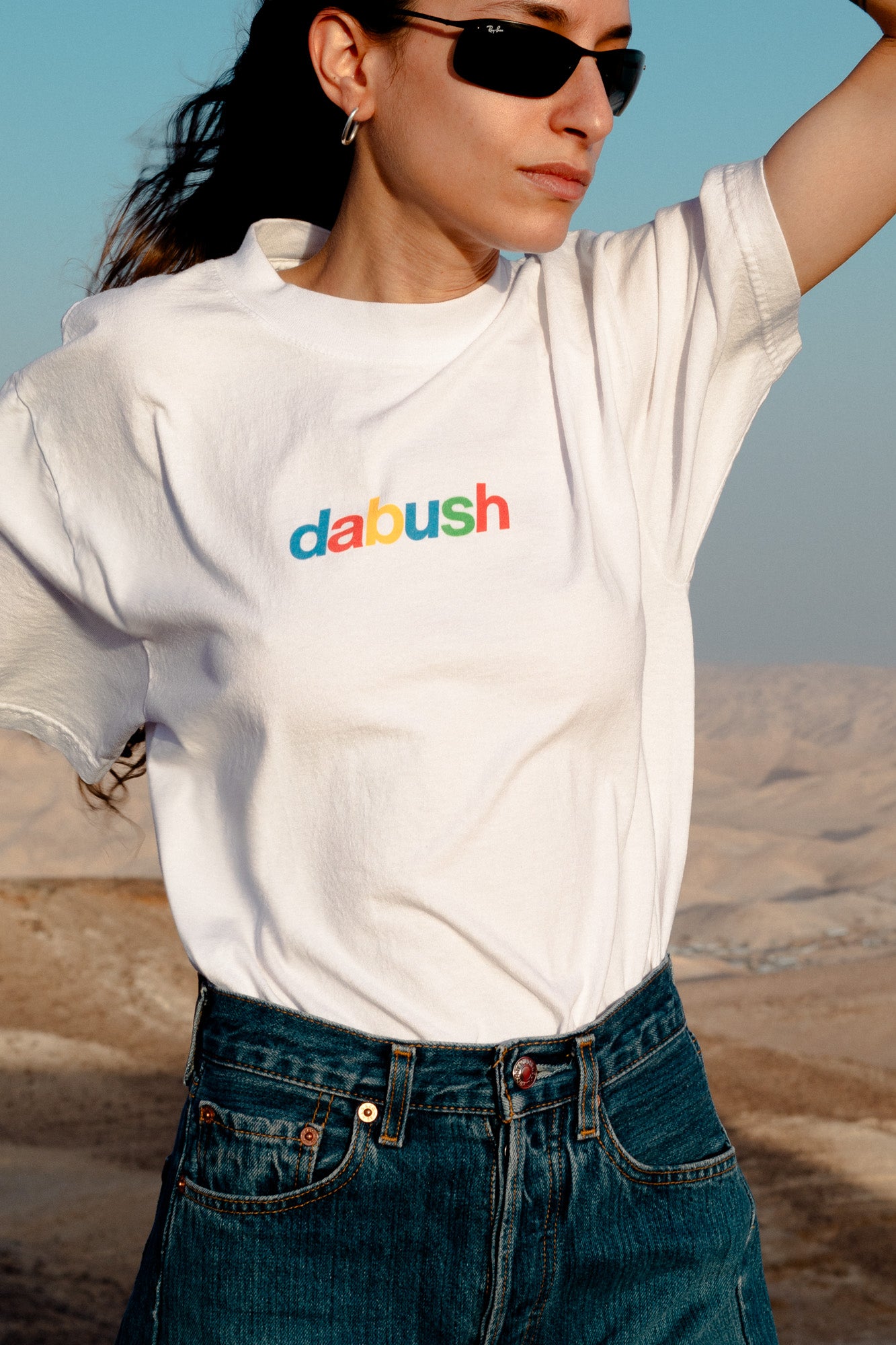 DABUSH T-SHIRT. 100% Cotton, oversized tee with Back and front print. Made in Tel aviv. Shop and view the latest Drops from the official DABUSH website. Worldwide Shipping. DABUSH is a publishing house, design studio and a brand based in Tel Aviv, Israel.