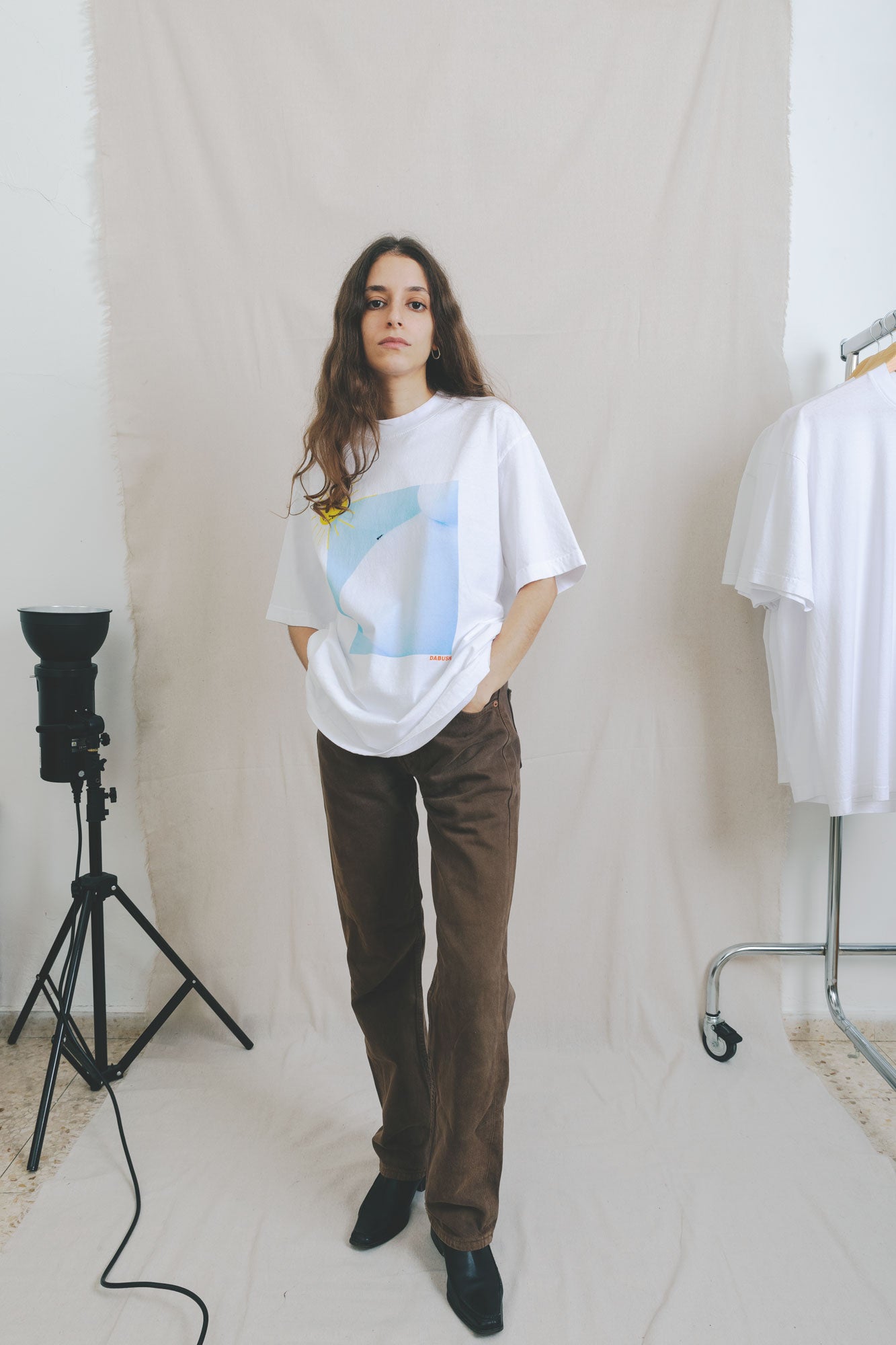 DABUSH PROTECTION T-SHIRT. 100% Cotton, oversized tee with  Back and front print. Made in Tel aviv. Shop and view the latest Drops from the official DABUSH website. Worldwide Shipping. DABUSH is a publishing house, design studio and a brand based in Tel Aviv, Israel.
