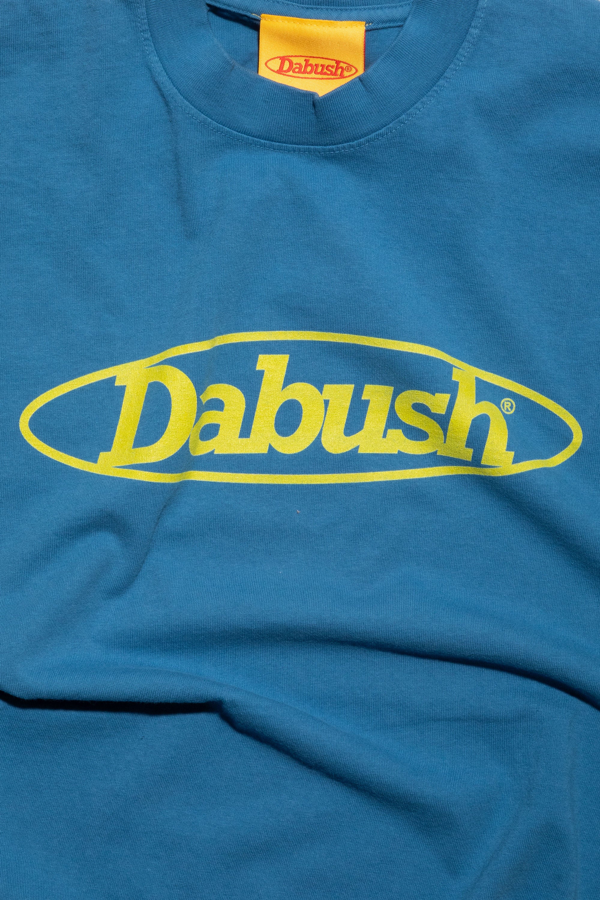 DABUSH MOTORACING T-SHIRT. 100% Cotton, oversized tee with Back and front print. Made in Tel aviv. Shop and view the latest Drops from the official DABUSH website. Worldwide Shipping. DABUSH is a publishing house, design studio and a brand based in Tel Aviv, Israel.