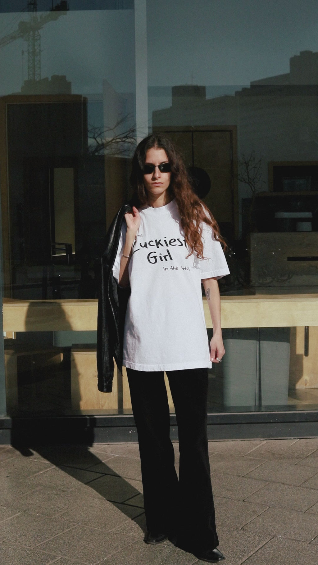 DABUSH LUCKY GIRL T-SHIRT. 100% Cotton, oversized tee with Back and front print. Made in Tel aviv. Shop and view the latest Drops from the official DABUSH website. Worldwide Shipping. DABUSH is a publishing house, design studio and a brand based in Tel Aviv, Israel. Lucky Girl Syndrome T-SHIRT.